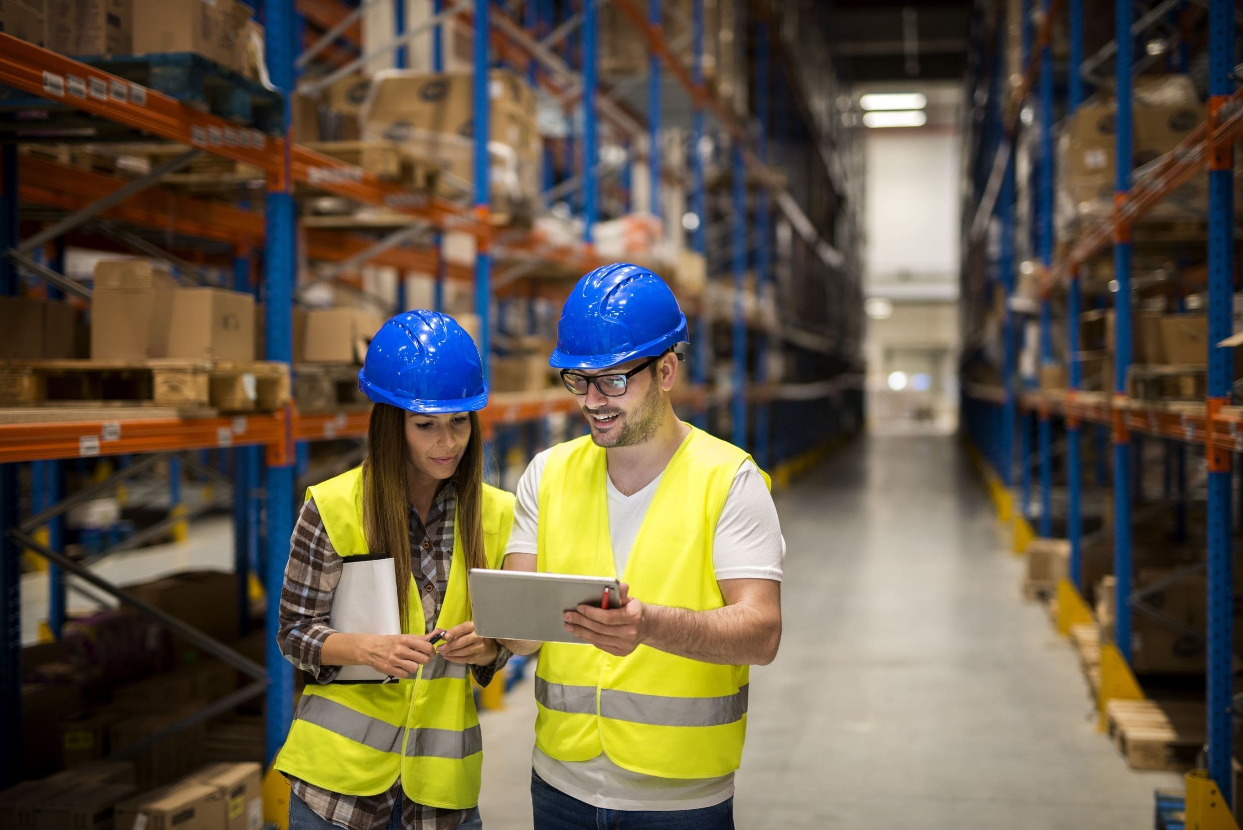 Manager using a digital solution to check level of stocks